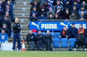 Paul Cook looks on from the touchline