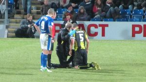 Zander Diamond receives treatment after the incident that saw Lester sent off