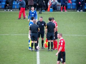 The two captains shake hands before kick off