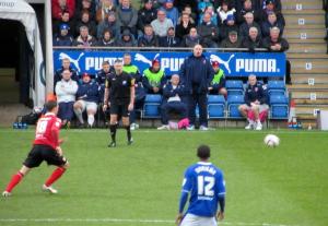 Shimps boss Jim Bentley watches the game