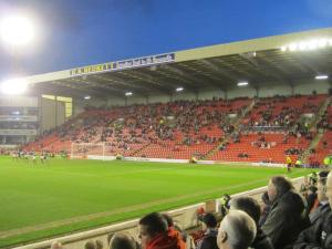The Barnsley fans watch the final few minutes of the game