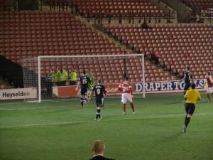 The keeper tips a hopeful effort on to the crossbar, but the rebound falls to Danny Rose who fires the ball home