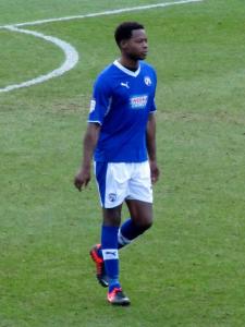 Neal Trotman returns to the starting line up, despite being placed on the transfer list by manager Paul Cook