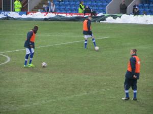 The substitutes warm up at half time
