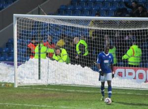 Nathan Smith gets the ball out of the net after Tomlin puts the visitors ahead