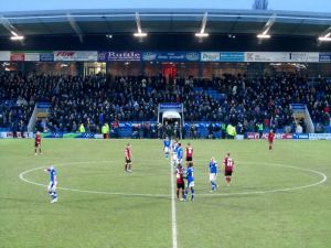 The players shake hands at full time