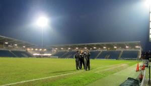 The Wimbledon coaches discuss the game at pitchside