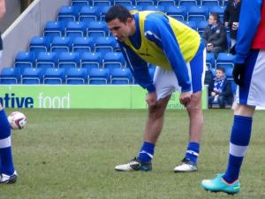 Jack Lester warms up with the substitutes after rumours about his future during the week