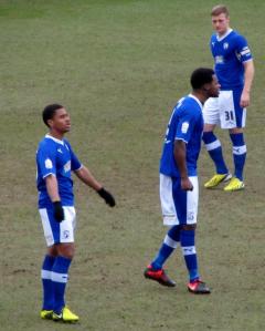 Richard Brindley prepares to make his first start at the Proact Stadium alongside Trotman and Cooper
