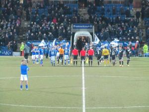 The players line up prior to kick off