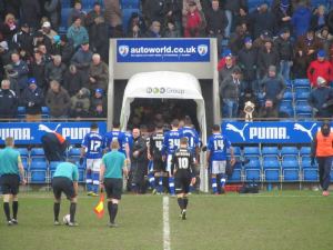 The players head to the dressing rooms with the score 0-0