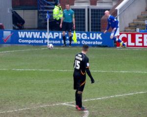 Danny Whitaker takes a late corner