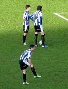 Miguel Llera lines up a free kick