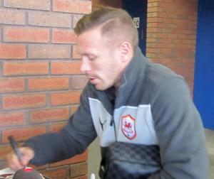 Craig Bellamy signs for the fans