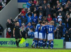 All the Chesterfield outfield players celebrate Jack's 93rd goal in a Chesterfield shirt