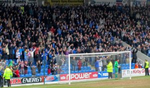 Fans on the Kop celebrate Darikwa's strike