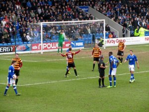 The Spireites win a free kick on the edge of the box