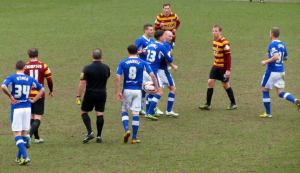 Drew Talbot reacts angrily after being caught in the face