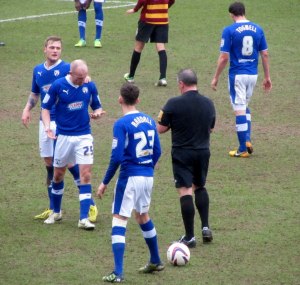 Talbot receives a yellow card because of this reaction