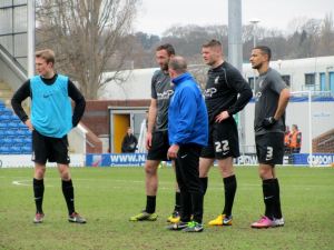 The visitors warm up