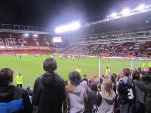 A few fans stay behind to applaud the players
