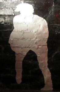 A silhouette of John, painted by Cynthia Lennon