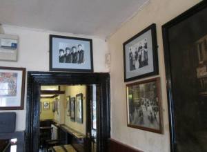 Beatles pictures hang all around the pub