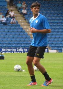 Miguel Llera warms up