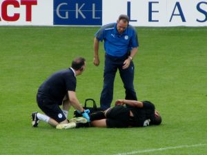 A Wednesday player receives treatment