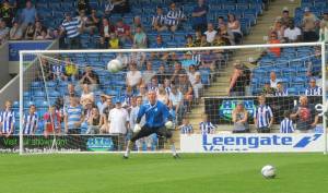A shot is fired at the goalkeeper during the warm up