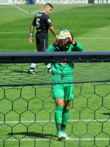 Tommy Lee applauds the travelling supporters