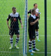 Humphreys, Togwell and O'Shea prepare to defend an early corner