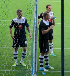 Humphreys, Togwell and O'Shea prepare to defend an early corner