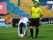 The referee makes sure Craig Jones take the free kick from the correct spot