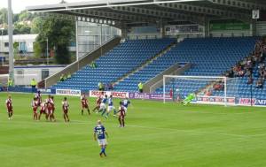 The strike forces a save from the keeper