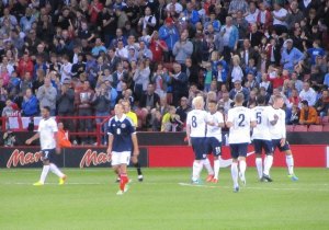The England players celebrate another goal