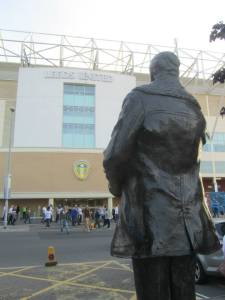 Revie looks over the ground