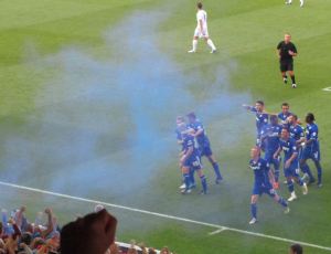 The players celebrate the opening goal