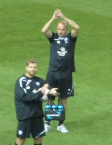Chesterfield boss Paul Cook claps the supporters