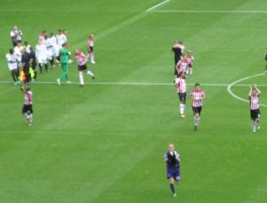 The United players applaud the fans