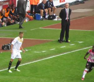 David Weir watches from the touchline