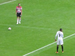 A free kick on the edge of the area for the Blades