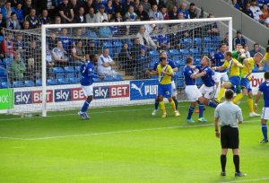 Tommy Lee punches the ball away