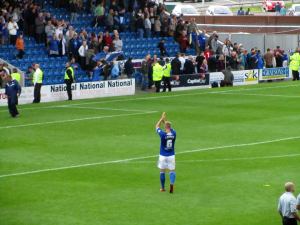 Cooper applauds the Kop