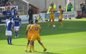 Mansfield receive a free kick on the edge of the box