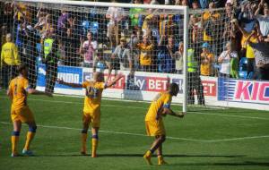 The Mansfield players celebrate the win