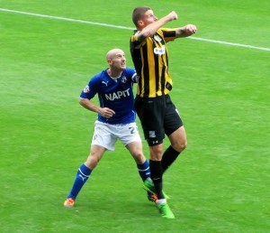 Talbot and Corr battle for posession