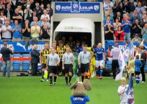 The players make their way onto the pitch