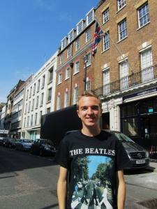 Stood outside the building