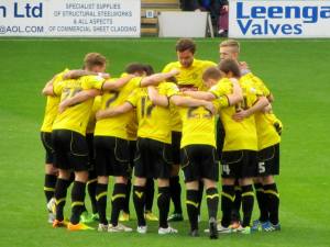 The Burton players huddle up
